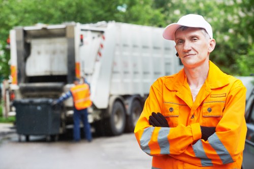 Professional team clearing office furniture in Peckham
