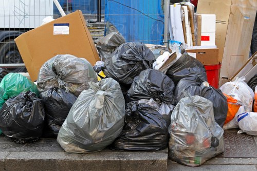 Front view of a business waste collection vehicle outside a Peckham commercial property