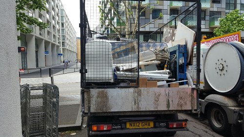 Garage clearance professionals sorting items